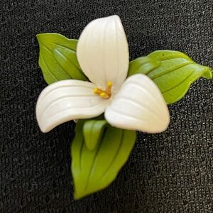 Vintage real leather Trillium brooch
